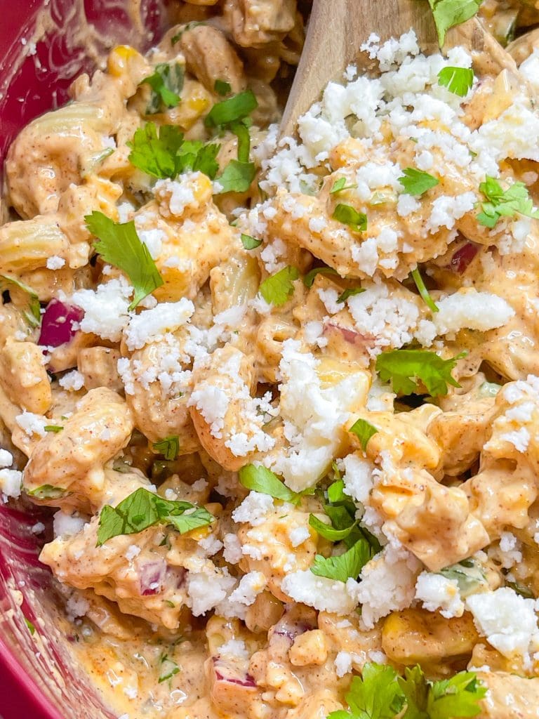 Street Corn Pasta Salad has all the ingredients of traditional Mexican street corn, but uses canned fire roasted corn, for a short cut, and has pasta.