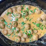 Our family loves Swedish Meatballs. The meatballs are so juicy and the sauce is velvety smooth; really what's not to love! Making Swedish meatballs in the crock pot is so easy. It's a dump and go type of recipe with frozen meatballs, for a short cut, and simple ingredients, like cream of mushroom soup, French onion soup, beef broth, and sour cream.