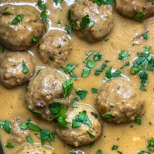 Our family loves Swedish Meatballs. The meatballs are so juicy and the sauce is velvety smooth; really what's not to love! Making Swedish meatballs in the crock pot is so easy. It's a dump and go type of recipe with frozen meatballs, for a short cut, and simple ingredients, like cream of mushroom soup, French onion soup, beef broth, and sour cream.