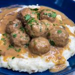 Our family loves Swedish Meatballs. The meatballs are so juicy and the sauce is velvety smooth; really what's not to love! Making Swedish meatballs in the crock pot is so easy. It's a dump and go type of recipe with frozen meatballs, for a short cut, and simple ingredients, like cream of mushroom soup, French onion soup, beef broth, and sour cream.