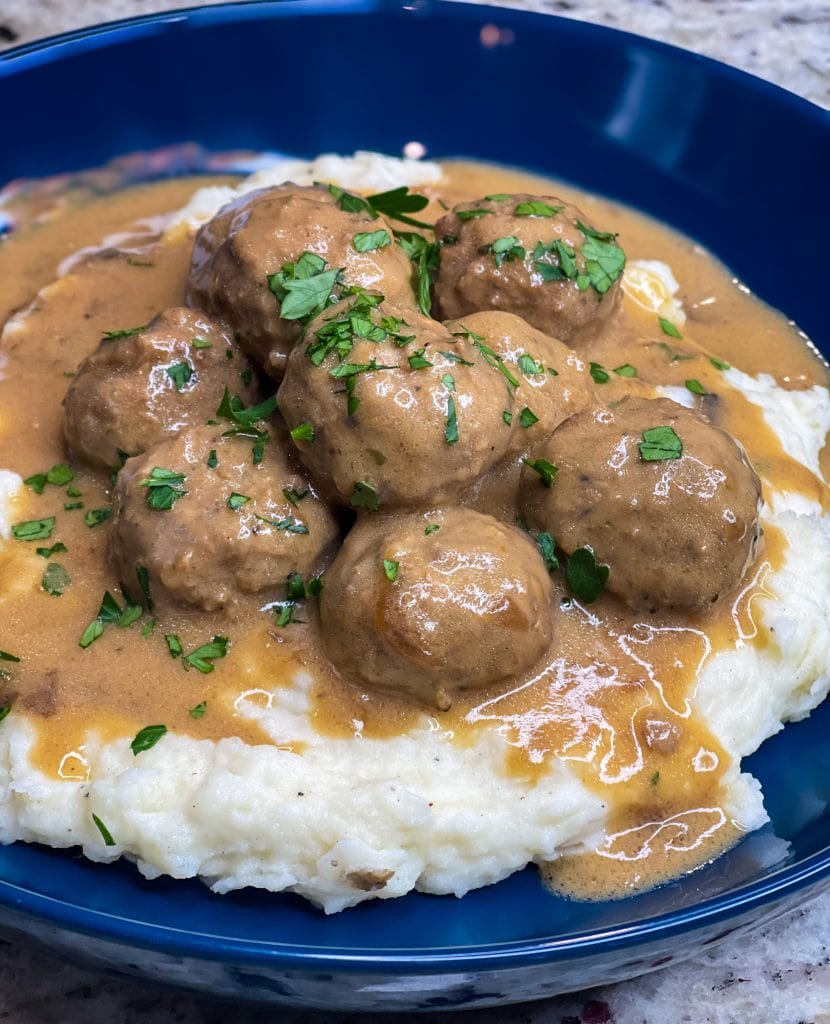 Our family loves Swedish Meatballs. The meatballs are so juicy and the sauce is velvety smooth; really what's not to love! Making Swedish meatballs in the crock pot is so easy. It's a dump and go type of recipe with frozen meatballs, for a short cut, and simple ingredients, like cream of mushroom soup, French onion soup, beef broth, and sour cream.