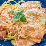 Crock Pot Tomato Basil Chicken a delicious and easy dinner with juicy chicken in a flavorful, creamy tomato based sauce. Serve alone for a low carb option or over pasta for a family friendly meal.