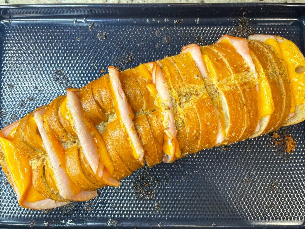 This Hasselback Turkey and Cheese Sandwich is the perfect crowd pleasing weeknight dinner or easy lunch. You can customize it with whatever meat and cheese you like.