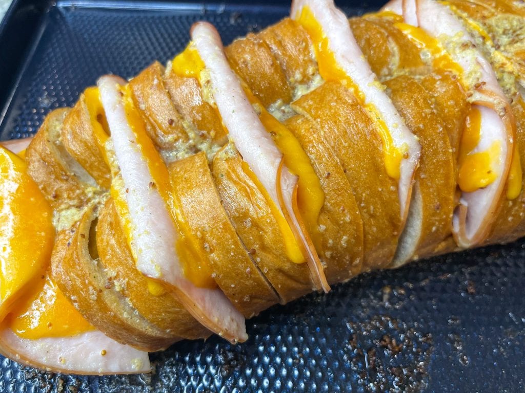 This Hasselback Turkey and Cheese Sandwich is the perfect crowd pleasing weeknight dinner or easy lunch. You can customize it with whatever meat and cheese you like. 