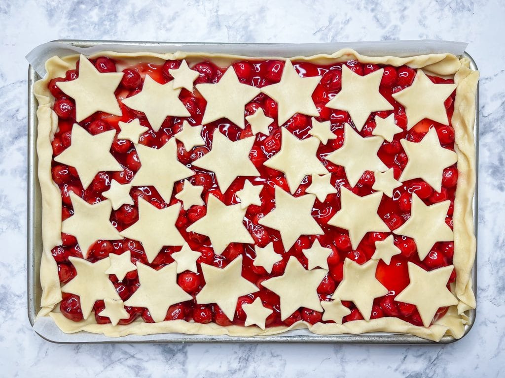 Cherry Slab Pie is the perfect summer dessert to feed a crowd and with only 3 ingredients, it's so easy!