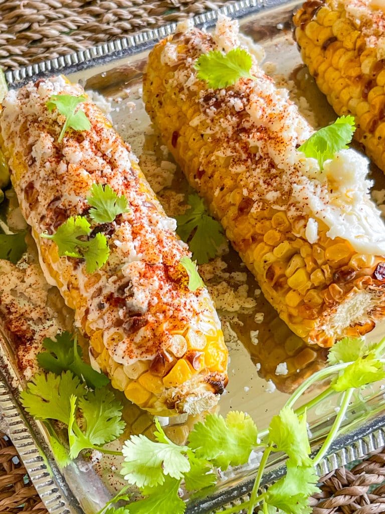 Air Fryer Corn on the Cob has such a delicious flavor, almost like a smoky grilled taste, without the hassle of a grill. It's so good all by itself, but turning it into Mexican Street Corn takes the air fryer corn to a whole new level