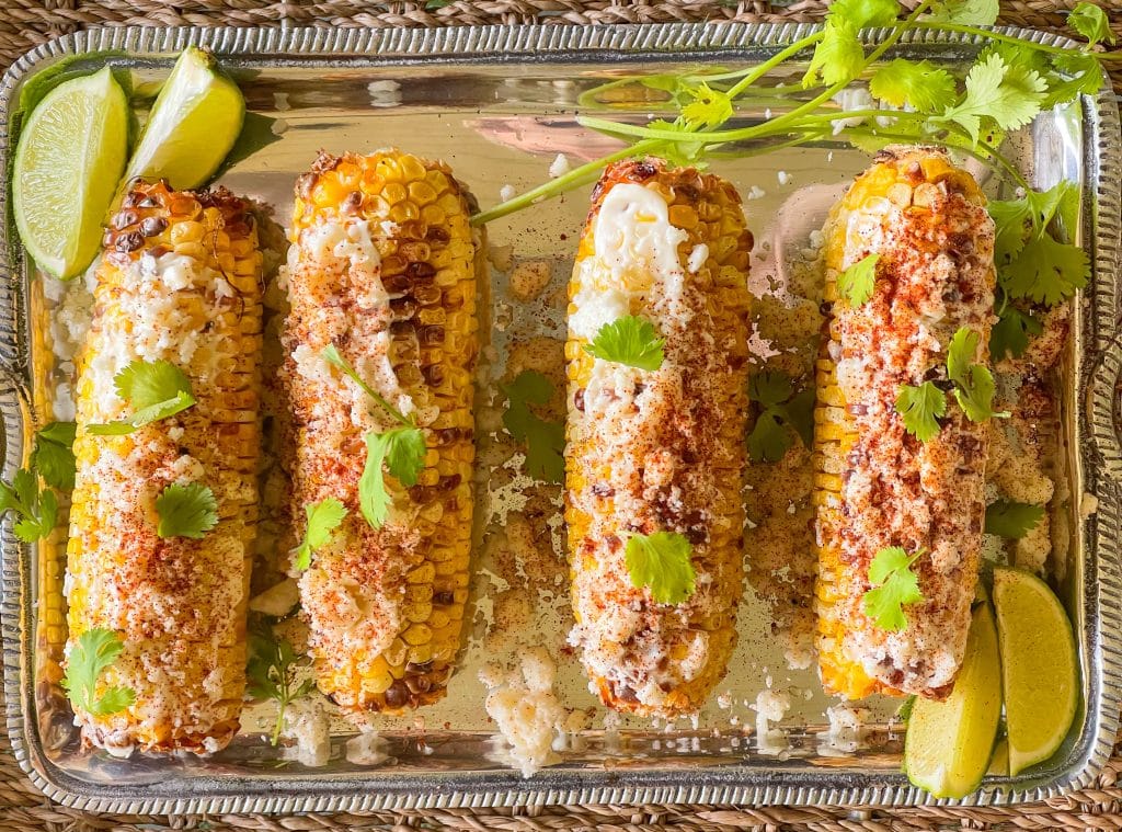 Air Fryer Corn on the Cob has such a delicious flavor, almost like a smoky grilled taste, without the hassle of a grill. It's so good all by itself, but turning it into Mexican Street Corn takes the air fryer corn to a whole new level