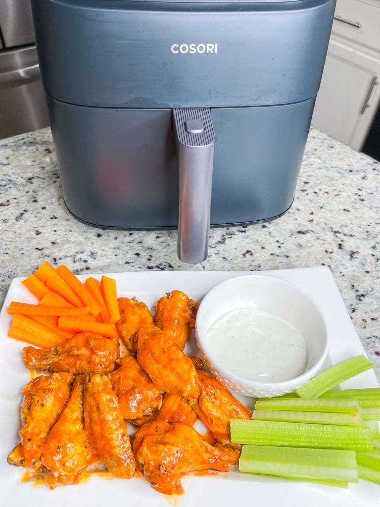 If you haven't made wings in the air fryer yet, this might change your life! Air Fryer Buffalo Wings are crispy, saucy, spicy, super delicious and so easy to prepare. Once you make wings in the air fryer, you may never go back to any other way to prepare them. The air fryer makes chicken wings crispy and flavorful. My life was changed for the better once I discovered ! can cook wings in my air fryer.