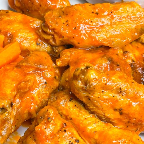 If you haven't made wings in the air fryer yet, this might change your life! Air Fryer Buffalo Wings are crispy, saucy, spicy, super delicious and so easy to prepare. Once you make wings in the air fryer, you may never go back to any other way to prepare them. The air fryer makes chicken wings crispy and flavorful. My life was changed for the better once I discovered ! can cook wings in my air fryer.