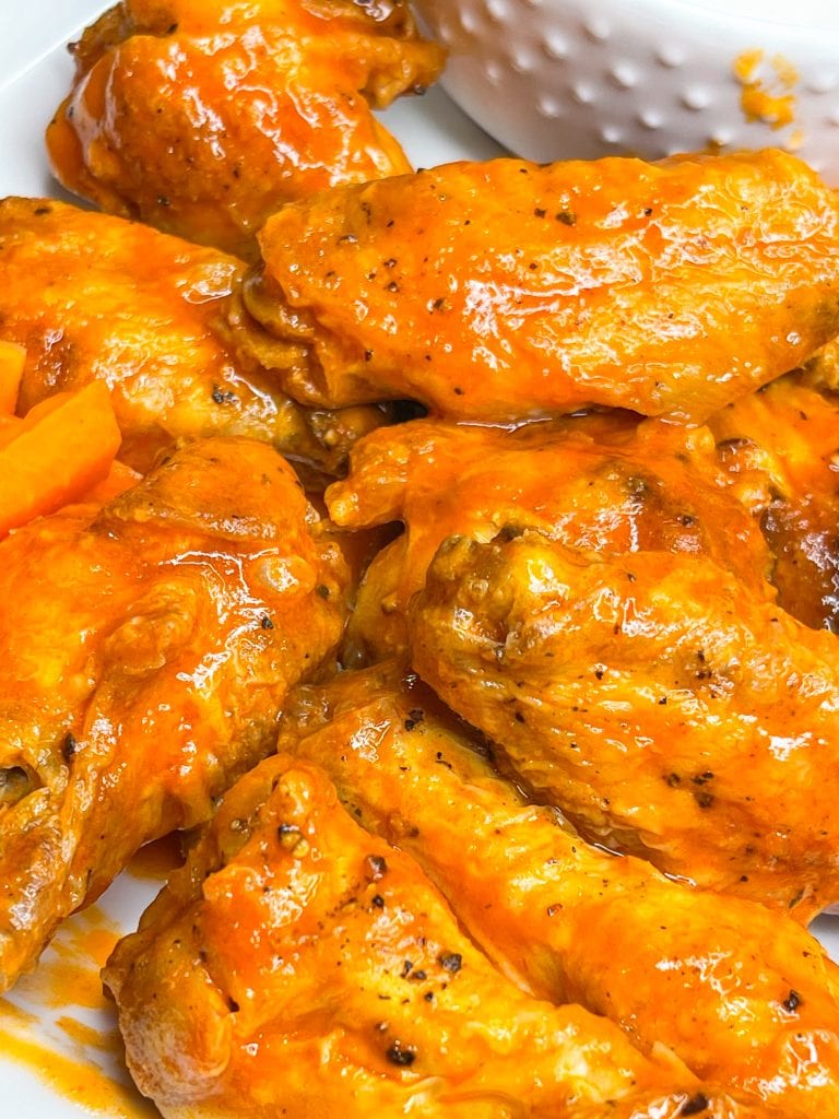 If you haven't made wings in the air fryer yet, this might change your life! Air Fryer Buffalo Wings are crispy, saucy, spicy, super delicious and so easy to prepare. Once you make wings in the air fryer, you may never go back to any other way to prepare them. The air fryer makes chicken wings crispy and flavorful. My life was changed for the better once I discovered ! can cook wings in my air fryer.