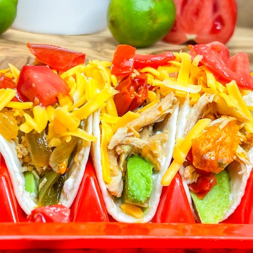 This family friendly recipe, Crock Pot Chicken Fajitas, is super simple to put together and requires just a few ingredients for an easy weeknight dinner. It freezes well too!