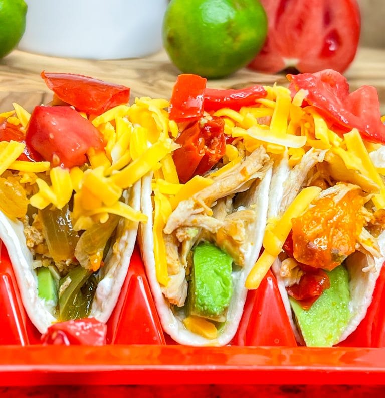 This family friendly recipe, Crock Pot Chicken Fajitas, is super simple to put together and requires just a few ingredients for an easy weeknight dinner. It freezes well too!