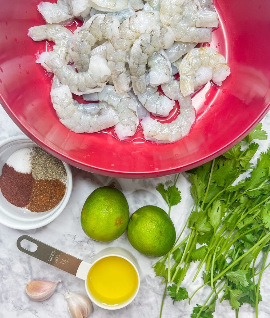 Tangy, spicy and juicy, Air Fryer Chili Lime Shrimp are super easy to make and taste delicious in a shrimp taco, over a bean and rice bowl, or enjoy accompanied with your favorite sides.