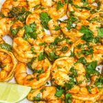 Tangy, spicy and juicy, Air Fryer Chili Lime Shrimp are super easy to make and taste delicious in a shrimp taco, over a bean and rice bowl, or enjoy accompanied with your favorite sides.