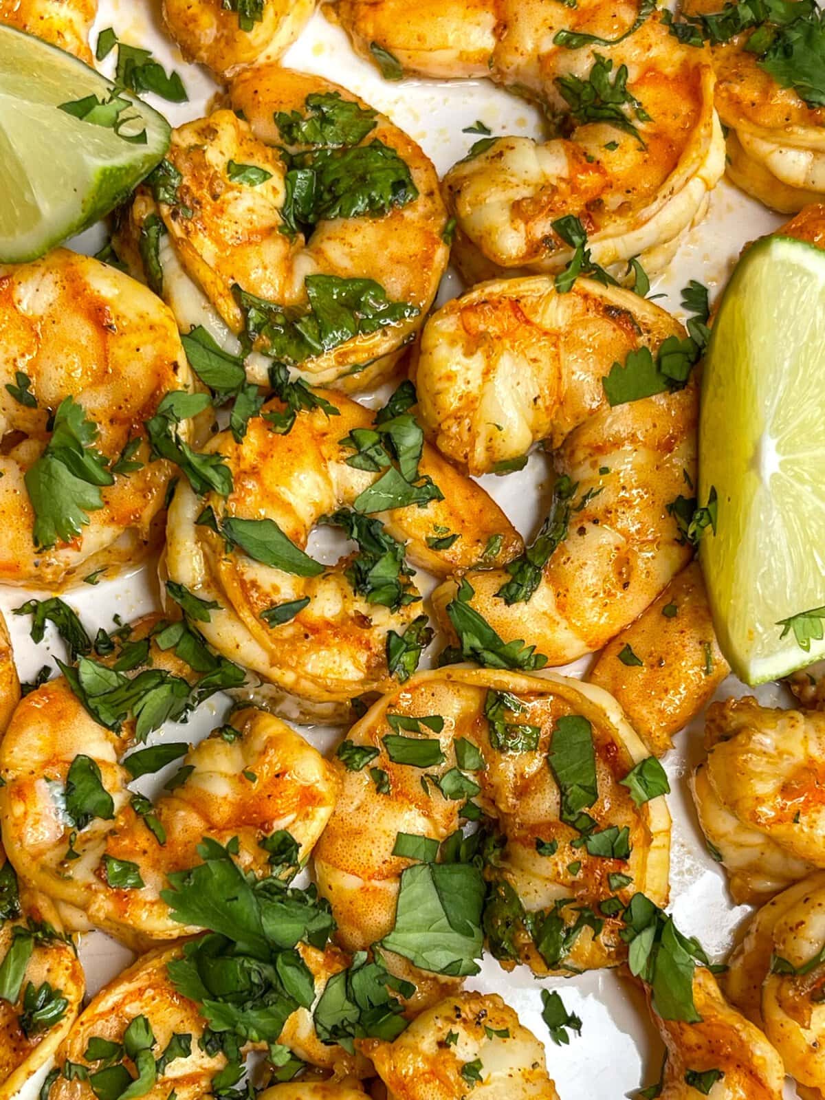 Tangy, spicy and juicy, Air Fryer Chili Lime Shrimp are super easy to make and taste delicious in a shrimp taco, over a bean and rice bowl, or enjoy accompanied with your favorite sides.