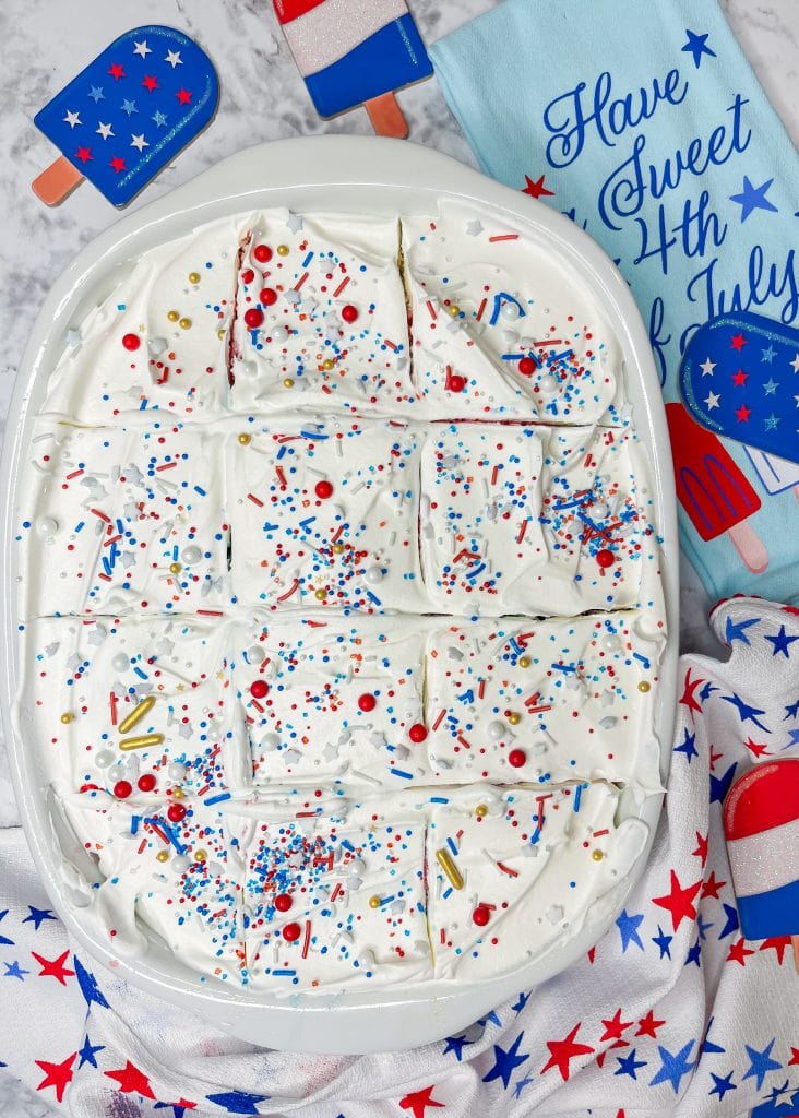 This Patriotic Jello Poke Cake is so easy to make and perfect for the 4th of July!