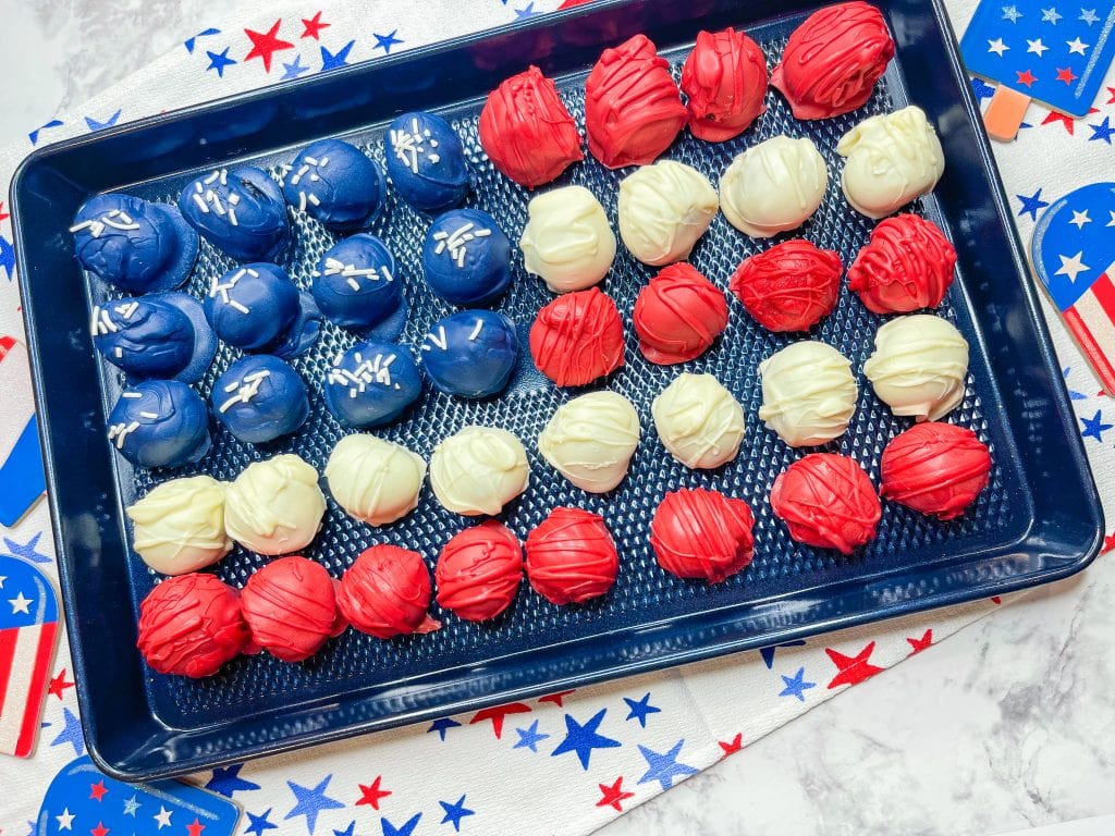 These Patriotic Oreo Truffles are only 5 easy ingredients, are simple to assemble, and look stunning on a 4th of July spread.