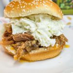 Just 4 simple pantry ingredients to a juicy Crock Pot BBQ Pulled Pork that's perfect to feed a crowd or just an easy, hands off dinner.