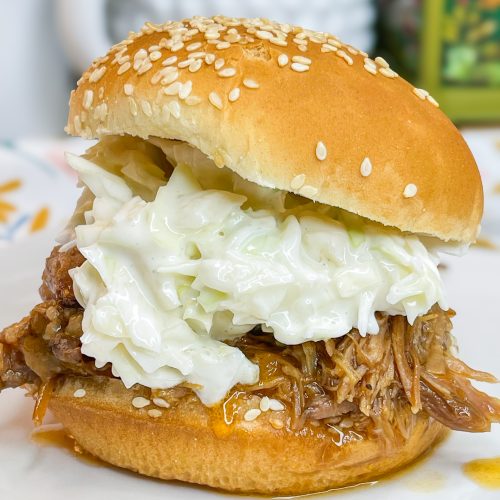 Just 4 simple pantry ingredients to a juicy Crock Pot BBQ Pulled Pork that's perfect to feed a crowd or just an easy, hands off dinner.