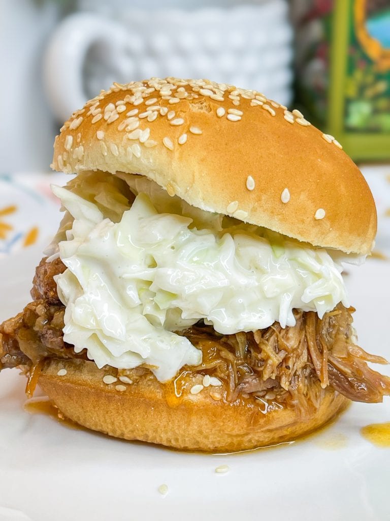 Just 4 simple pantry ingredients to a juicy Crock Pot BBQ Pulled Pork that's perfect to feed a crowd or just an easy, hands off dinner.