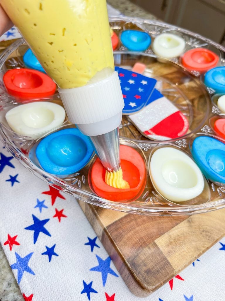 If you are making deviled eggs for your 4th of July party, make Red, White, and Blue Deviled Eggs!