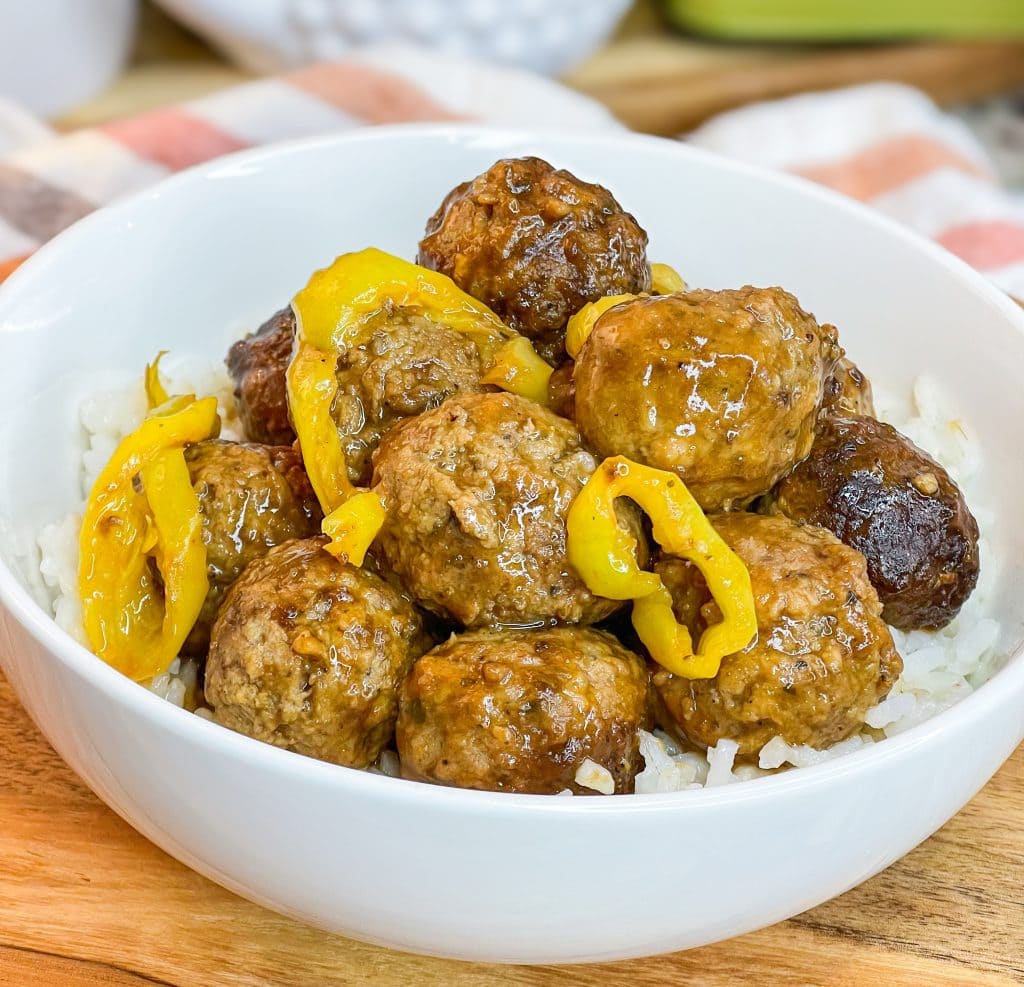 If you love the original Mississippi Pot Roast with ranch seasoning, au jus, and pepperoncini's, you will love this super simple meatball version using frozen meatballs for an easy weeknight shortcut. 