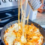 Dinner all in one skillet is the holy grail of meals and this One Pan Cheesy Ravioli is no exception! It's quick, easy, comforting, and best of all-super cheesy. Your family will gobble it up.