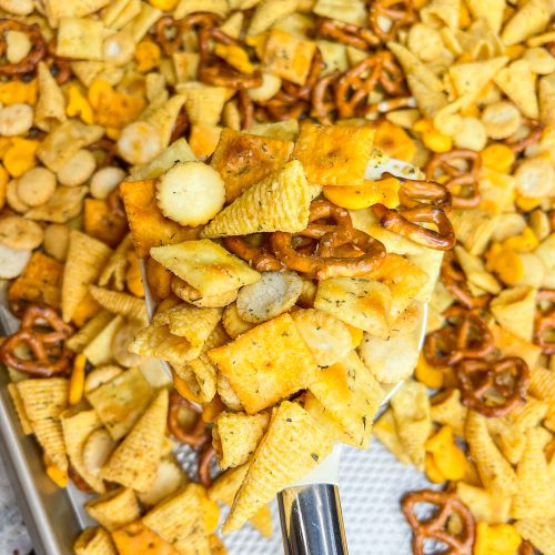 What's the most important thing to remember on a long road trip? The snacks, of course! This Road Trip Snack Mix is filled with all of the favorites; Goldfish crackers, oyster crackers, pretzels, and Bugles seasoned with ranch and spices. It's hard to put down, so it's a good thing this makes a lot!