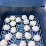 When you are craving warm, pillowy donut holes, look no further than this four ingredient recipe for Air Fryer Donut Holes made quickly and easily with refrigerated canned biscuit dough.