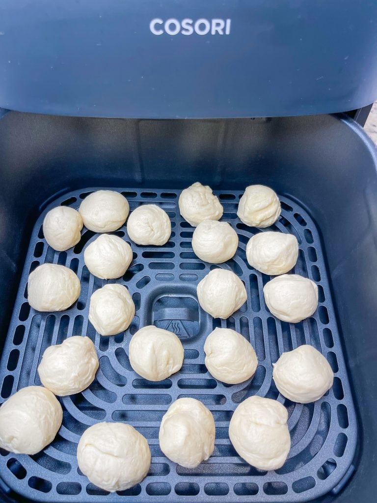 When you are craving warm, pillowy donut holes, look no further than this four ingredient recipe for Air Fryer Donut Holes made quickly and easily with refrigerated canned biscuit dough.