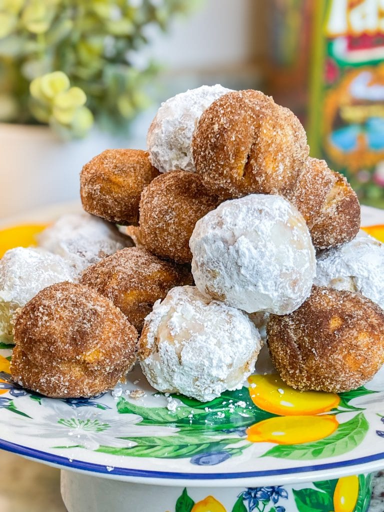 When you are craving warm, pillowy donut holes, look no further than this four ingredient recipe for Air Fryer Donut Holes made quickly and easily with refrigerated canned biscuit dough. 