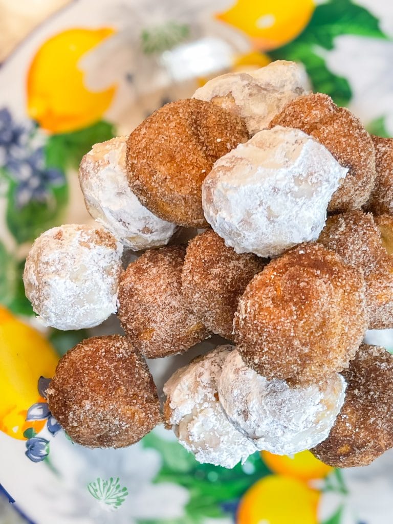 When you are craving warm, pillowy donut holes, look no further than this four ingredient recipe for Air Fryer Donut Holes made quickly and easily with refrigerated canned biscuit dough.