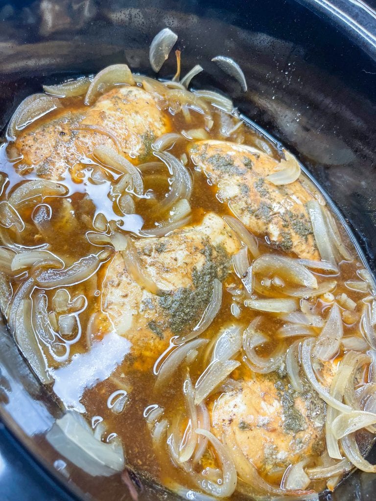 If you love French onion soup, you will love Crock Pot French Onion Chicken. Juicy chicken breast smothered in sweet vidalia onions and broth, covered in melty Swiss cheese. It's a dump-and-go dinner perfect for any night!