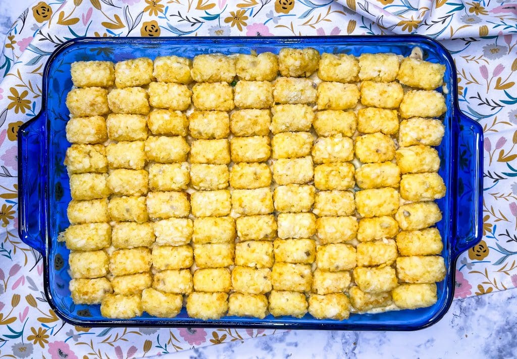 Chicken Tot Pie is everything you love about a comforting chicken pot pie, but topped with crispy tater tots. What's not to love!