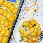 If you are craving comfort food, this is what you want to make. It's a one dish meal, just toss everything in your casserole dish, add frozen tots and bake it to perfection. I love this dinner on a busy weeknight, especially when everyone seems extra hungry because this chicken tot pie is filling and hits the spot.