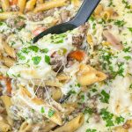 This One Pan Cheesesteak Pasta is filled with ground beef, peppers, onions, penne pasta, and of course, cheese! It's made all in one pan for an easy, family friendly weeknight dinner.