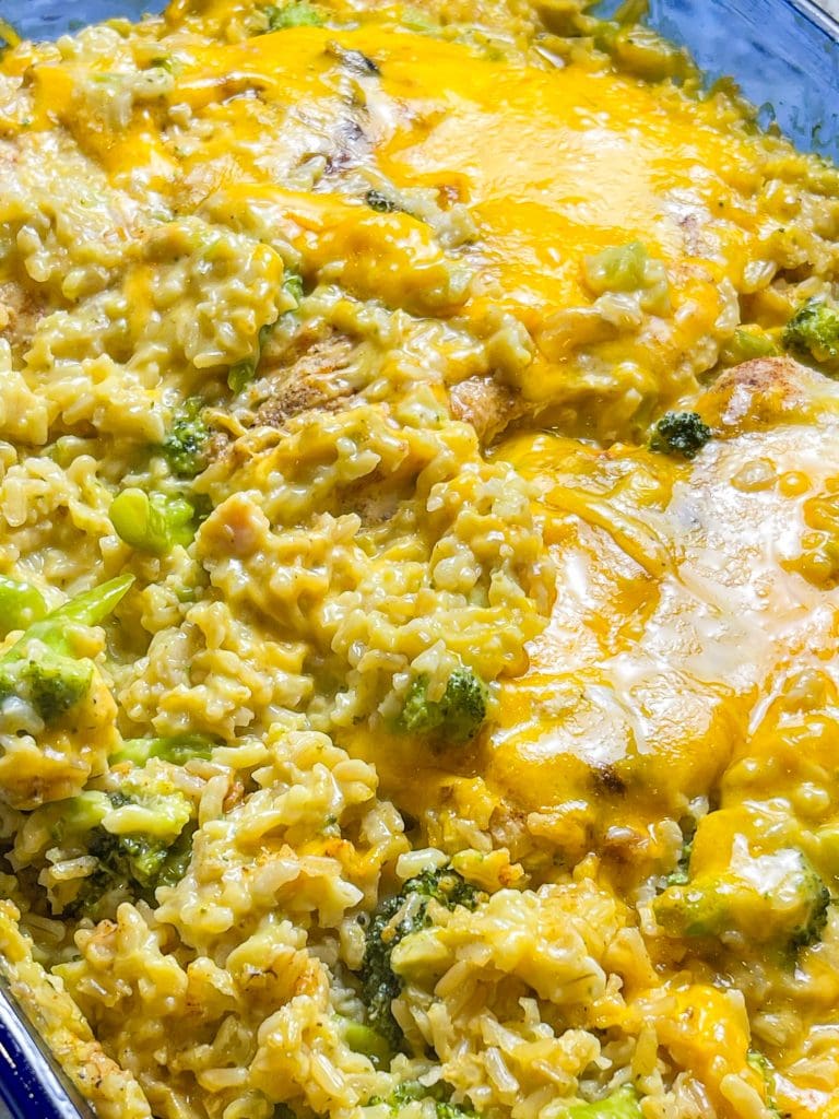 This one dish Cheddar Broccoli Casserole is a full meal in a pan with cheesy, creamy rice, broccoli florets, and juicy chicken. A weeknight staple.