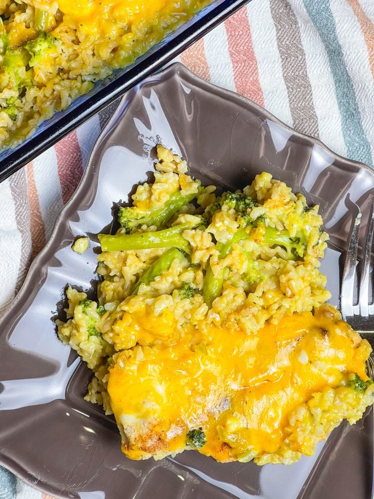 This one dish Cheddar Broccoli Casserole is a full meal in a pan with cheesy, creamy rice, broccoli florets, and juicy chicken. A weeknight staple.