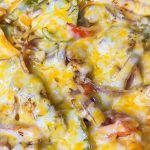 Chicken Fajita Casserole is everything you love about fajitas in a family friendly, one dish casserole. It's a super easy dump-and-bake recipe with rice, bell peppers, onions, fajita seasoned chicken, and melty cheese.