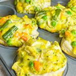 Mini Chicken Pot Pies are delicious little muffins, made with only 4 main ingredients: refrigerated biscuit dough, rotisserie chicken, frozen mixed vegetables, and cream of chicken soup. These delicious pies make a kid-friendly, quick, weeknight dinner!