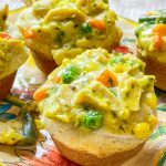 Mini Chicken Pot Pies are delicious little muffins, made with only 4 main ingredients: refrigerated biscuit dough, rotisserie chicken, frozen mixed vegetables, and cream of chicken soup. These delicious pies make a kid-friendly, quick, weeknight dinner!