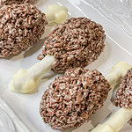 Rice Krispie Treat Turkey Legs are so much fun for Thanksgiving! They are made with chocolate Rice Krispies, white chocolate, mini marshmallows, and pretzel sticks. The drumsticks look like turkey legs but taste just like the Rice Krispie Treats you love.