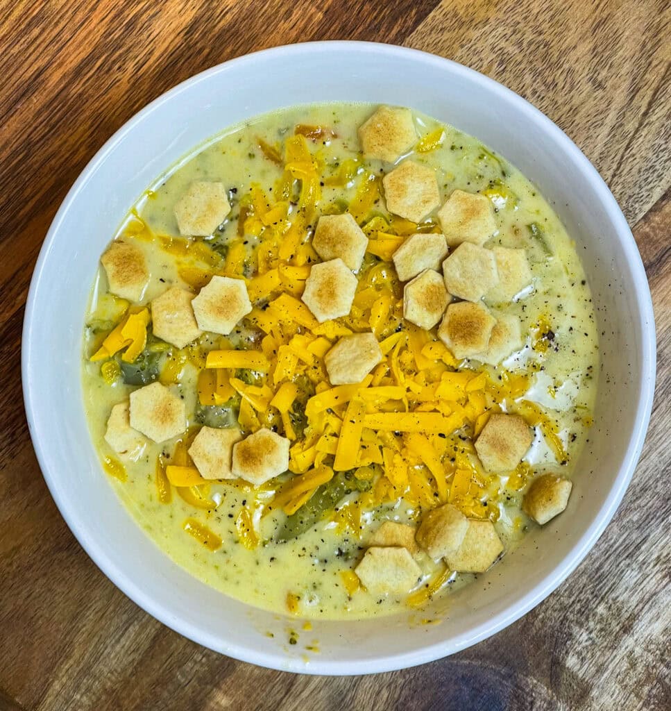 Crock Pot Broccoli Cheese Soup is creamy, comforting and familiar. It's a hugely popular soup made with broccoli, shredded carrots, cream, broth and sharp cheddar cheese.