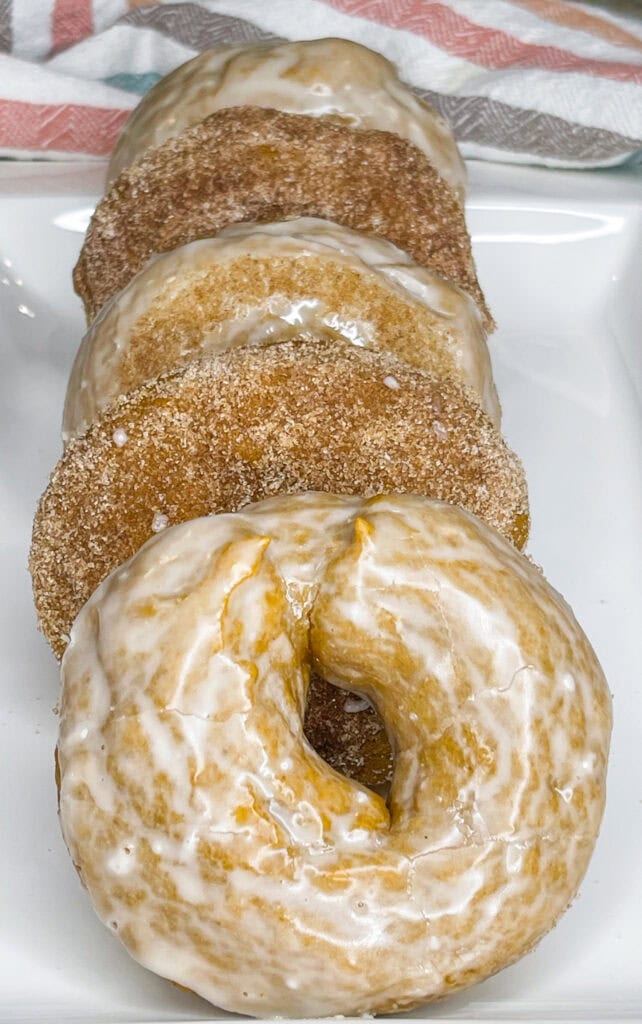 THE treat of the fall season, Baked Pumpkin Spice Donuts are a must have when the weather starts to turn! This recipe shows you two ways to top these warmly spiced donuts- with cinnamon and sugar and with a sweet glaze. Which topping will be your favorite?