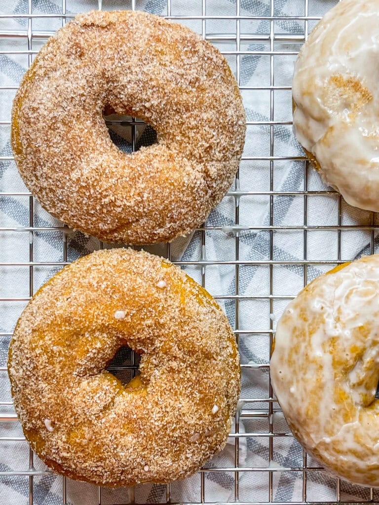 THE treat of the fall season, Baked Pumpkin Spice Donuts are a must have when the weather starts to turn! This recipe shows you two ways to top these warmly spiced donuts- with cinnamon and sugar and with a sweet glaze. Which topping will be your favorite?