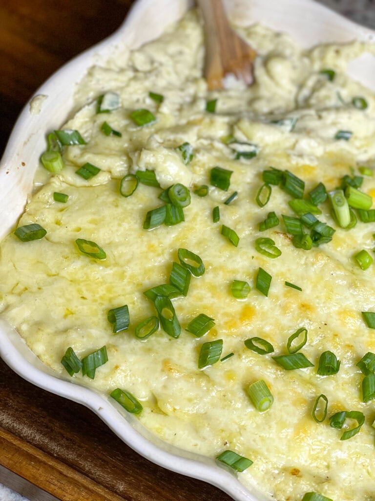 These Extra Cheesy Mashed Potatoes are just that- creamy, dreamy, fluffy and extra cheesy from a mix of sharp white cheddar and cream cheeses. A great side dish for any occasion or meal.