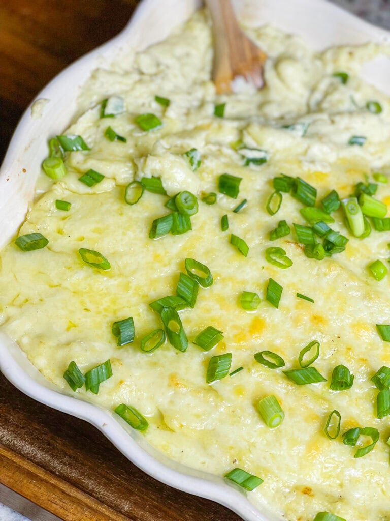 These Extra Cheesy Mashed Potatoes are just that- creamy, dreamy, fluffy and extra cheesy from a mix of sharp white cheddar and cream cheeses. A great side dish for any occasion or meal.