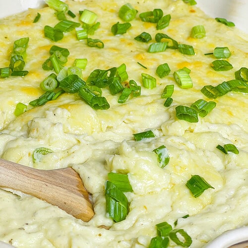 These Extra Cheesy Mashed Potatoes are just that- creamy, dreamy, fluffy and extra cheesy from a mix of sharp white cheddar and cream cheeses. A great side dish for any occasion or meal.