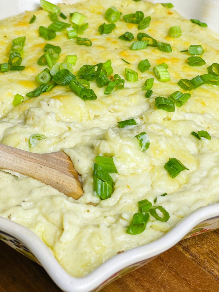 These Extra Cheesy Mashed Potatoes are just that- creamy, dreamy, fluffy and extra cheesy from a mix of sharp white cheddar and cream cheeses. A great side dish for any occasion or meal.