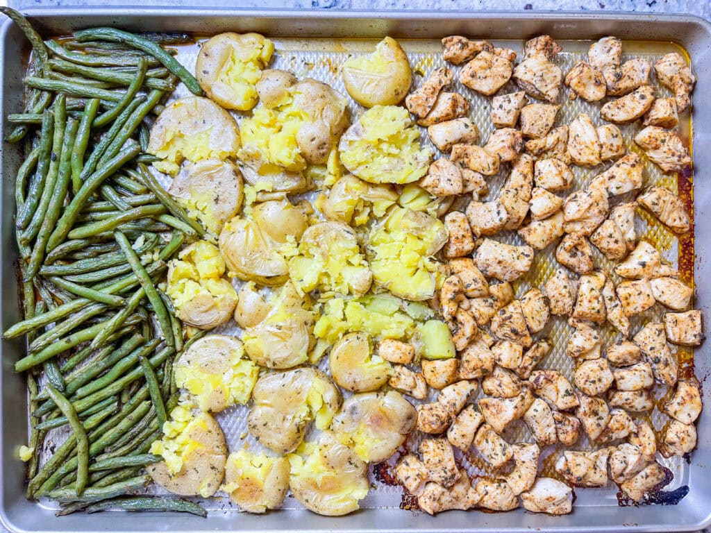 This easy Sheet Pan Ranch Chicken dinner is a weeknight lifesaver! Juicy chicken, tender baby potatoes, and crisp-tender green beans are tossed in flavorful ranch seasoning and roasted together on one pan.